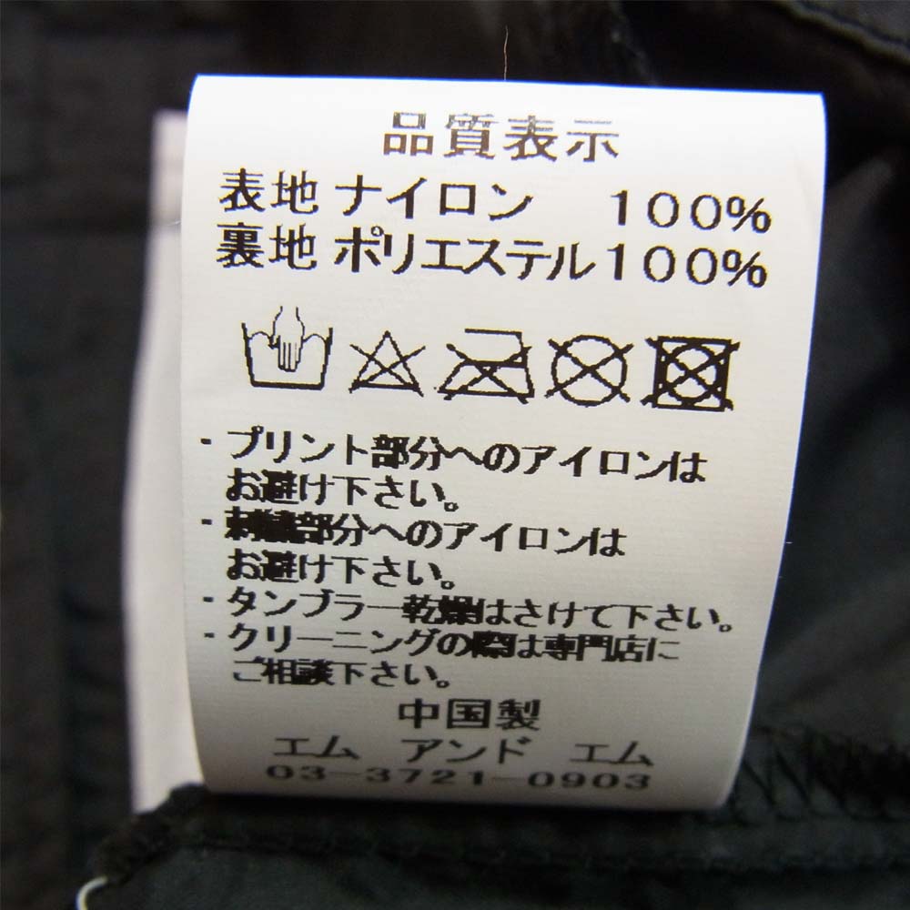 エムアンドエムカスタムパフォーマンス PRINT WINDBREAKER プリント ウィンドブレーカー コーチジャケット ブラック系 S【新古品】【未使用】【中古】