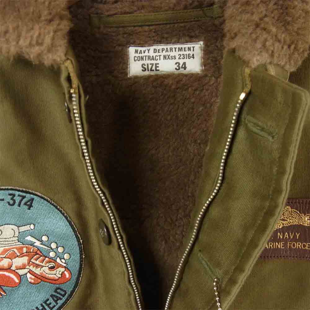 TOY'S McCOY トイズマッコイ TMJ1431 N-1 FELIX SS-374 ロガーヘッド フィリックス ワッペン バックプリント デッキ ジャケット カーキ系 34【新古品】【未使用】【中古】