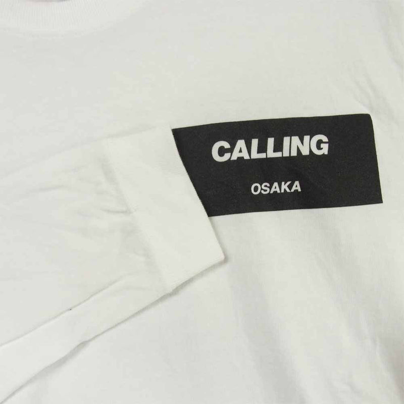 イサムカタヤマ バックラッシュ CALLING OSAKA ロンT 長袖 Tシャツ ホワイト系 M【中古】