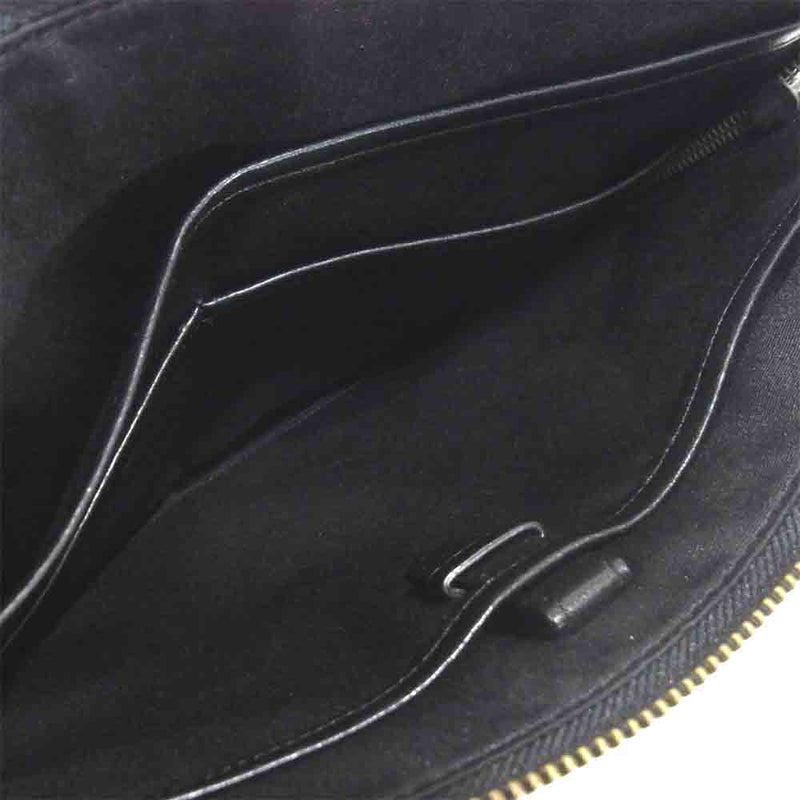 極美品 コーチ PVC クラッチバッグ シグネチャー ロゴ型押しファスナー 黒