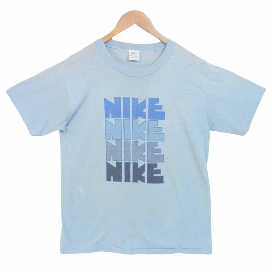 NIKE ナイキ 70S オレンジタグ ナイキ4連 ロゴ ゴツナイキ Tシャツ USA製 ライトブルー系 L【中古】