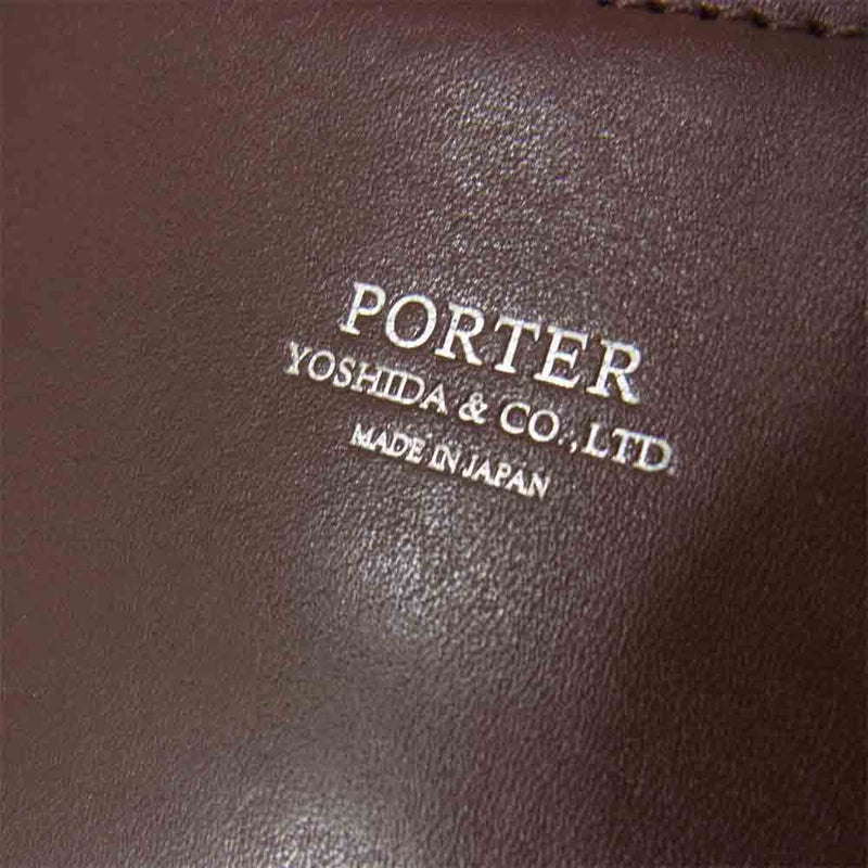 PORTER ポーター ラウンドジップ クラッチ バッグ ブラウン系【中古