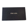 PRADA プラダ SAFFIANO VERNIC サフィアーノ ヴェルニ ラウンドジップ スタッズ 長財布 ブラック系【中古】