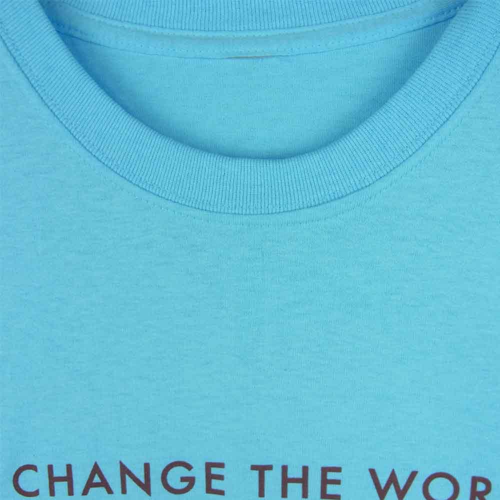 ティーアールサスペンション CHANGE THE WORLD (a little bit) 半袖 Tシャツ ライトブルー系【中古】