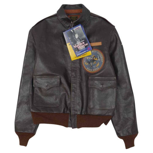 TOY'S McCOY トイズマッコイ TMJ1713 A-2 MARILYN MONROE"TARGET FOR TONIGHT マリリンモンロー フライト ジャケット ブラウン系 40【新古品】【未使用】【中古】