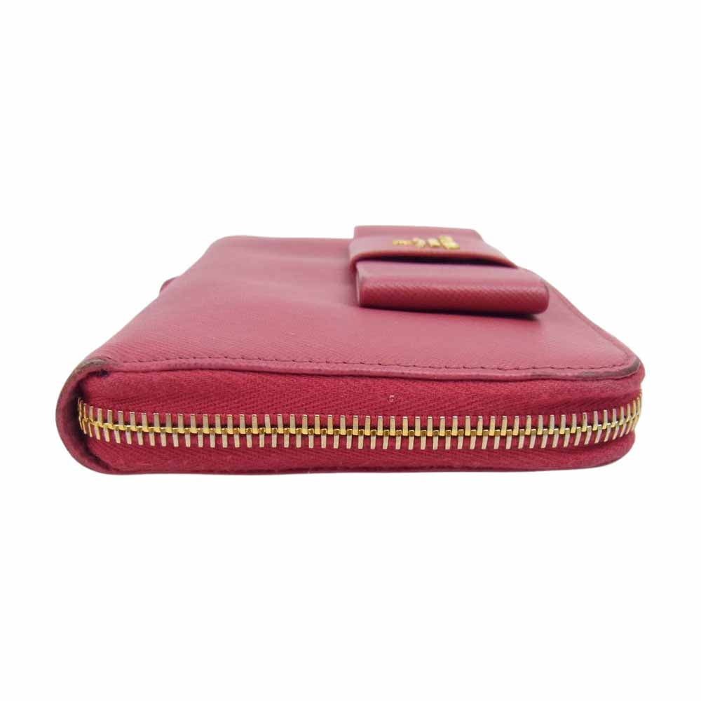 PRADA プラダ 1M0506 サフィアーノ リボン ラウンドファスナー ウォレット レッド系 F0505 PEONIA TU【中古】
