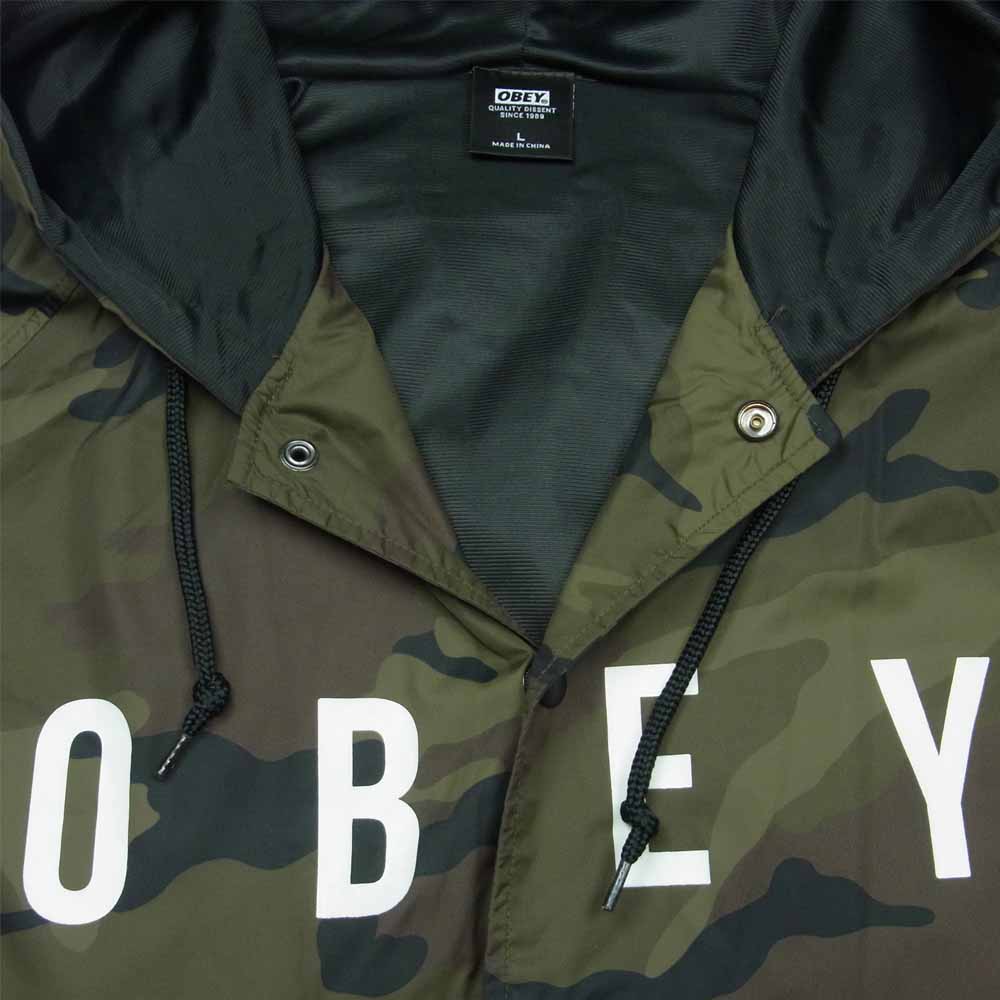 OBEY オベイ カモフラ ロゴ パーカー ナイロン 中国製 カーキ系 L【中古】