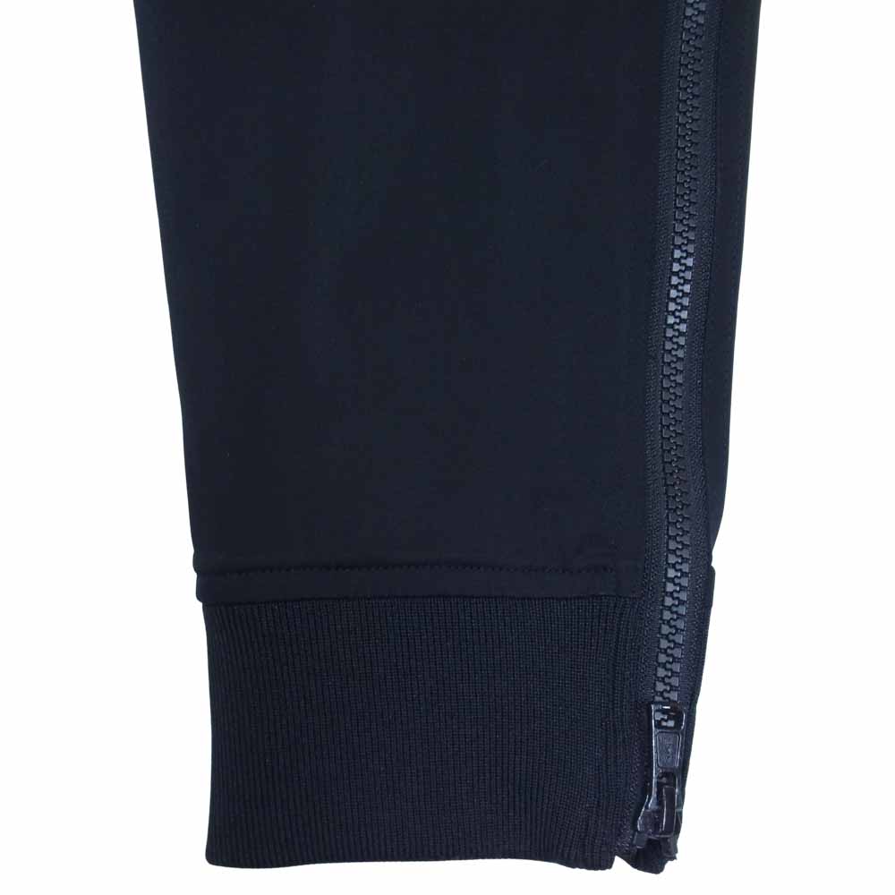 AKM エイケイエム x Brown bunny ブラウンバニー LUXE163 スター カモ プリント 裾ジップ ストレッチ イージー パンツ ブラック系 L【中古】