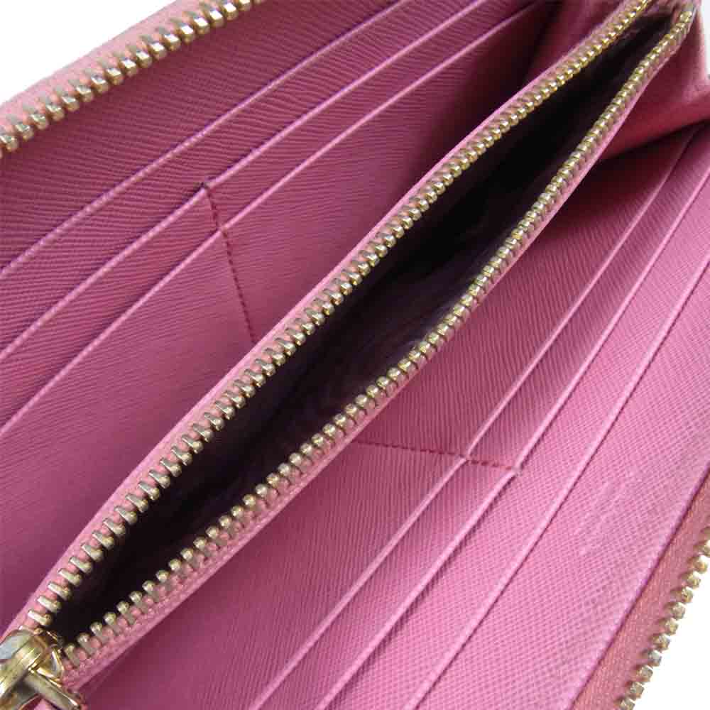 PRADA プラダ 1M0506 ギャラ付き SAFFIANO サフィアーノ ラウンドファスナー 長財布 ウォレット ピンク系【中古】