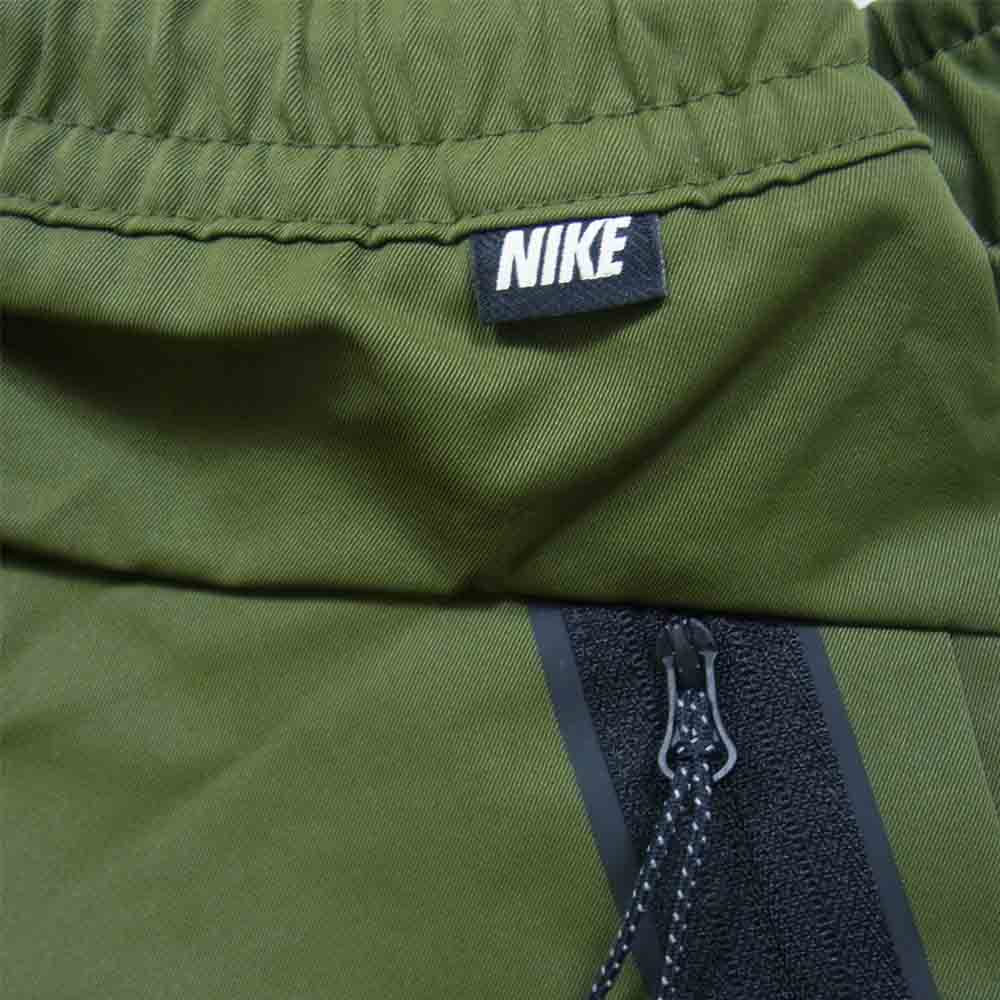 NIKE ナイキ FREAK'S STORE standaed fit taper leg regular length ナイロンパンツ オリーブ系 S【新古品】【未使用】【中古】