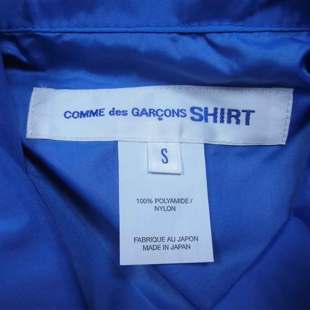 COMME des GARCONS コムデギャルソン Shirt Yue Minjun 21SS FG-J001 バックプリント コーチ ジャケット ブルー系 S【美品】【中古】