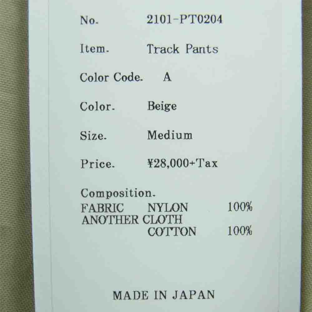 クオン 2101-PT0204 SALT SHRUNK NYLON TRACK PANTS BORO 襤褸 ボロ サイドライン 塩縮ナイロン トラック パンツ ベージュ系 M【新古品】【未使用】【中古】