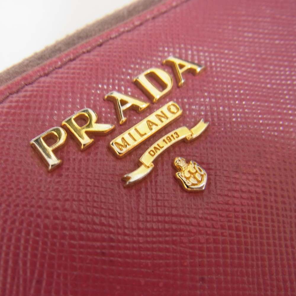 PRADA プラダ サフィアーノ レザー ラウンド ファスナー 長財布 ウォレット ピンク系【中古】