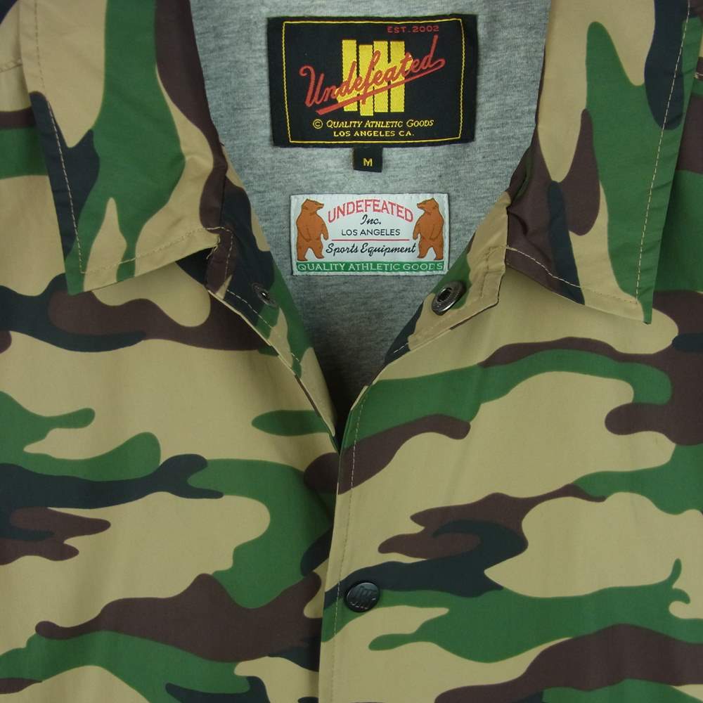 UNDEFEATED アンディフィーテッド UNDFTD バックロゴ カモ 迷彩 コーチ ジャケット 中国製 カーキ系 M【中古】
