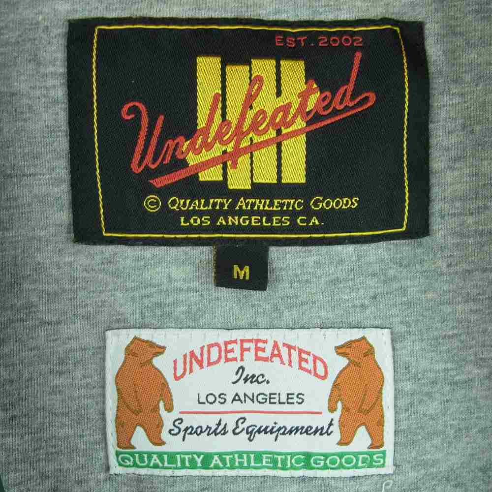 UNDEFEATED アンディフィーテッド UNDFTD バックロゴ カモ 迷彩 コーチ ジャケット 中国製 カーキ系 M【中古】
