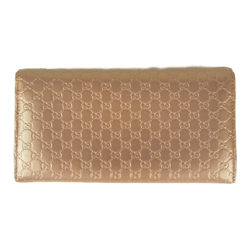GUCCI グッチ 258405 0416 シャイニー マイクロ グッチ シマ リボン チャーム フラップ ウォレット 長財布  ピンク系【中古】