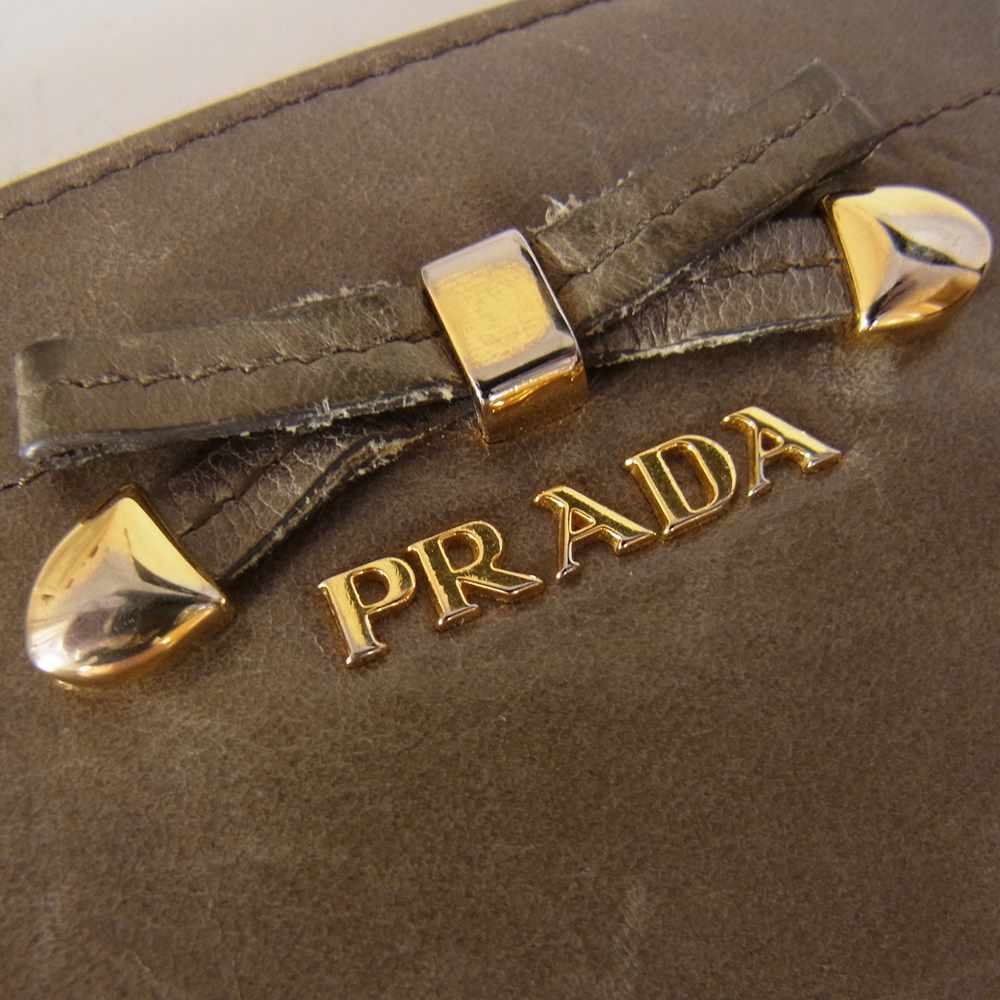 PRADA プラダ レザー リボン L字 ファスナー ジップ ウォレット 長財布 グレー系【中古】