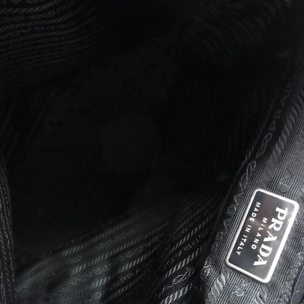 PRADA プラダ フラップ 巾着 レザー リュック ブラック系【中古】