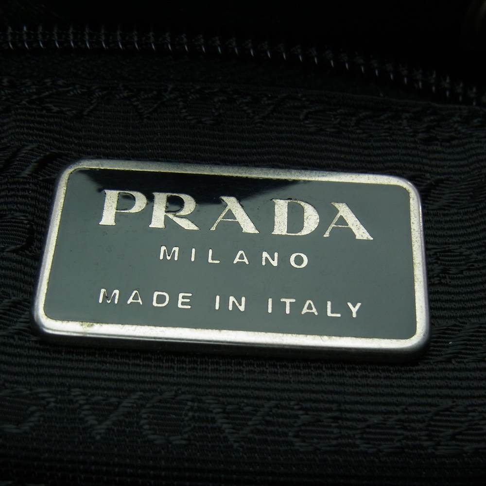 PRADA プラダ フラップ 巾着 レザー リュック ブラック系【中古】