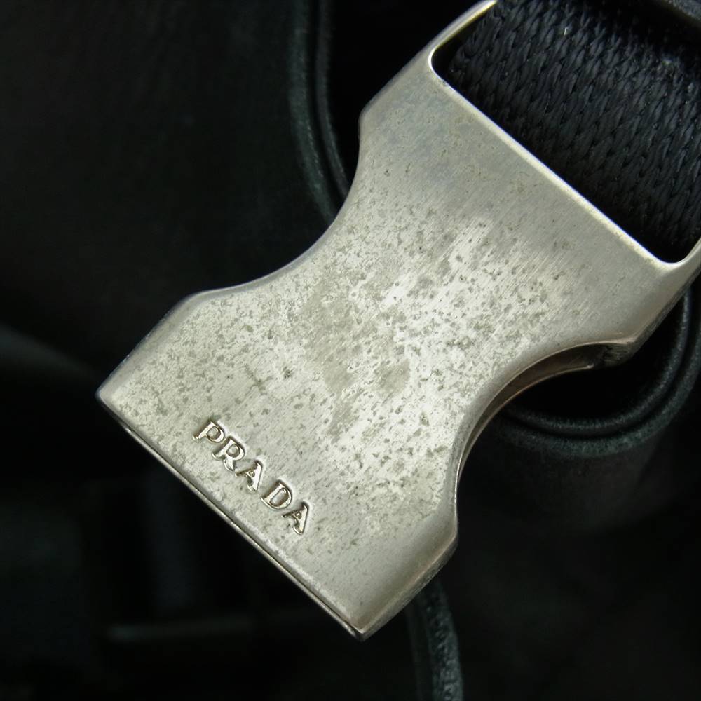 PRADA プラダ フラップ 巾着 レザー リュック ブラック系【中古】