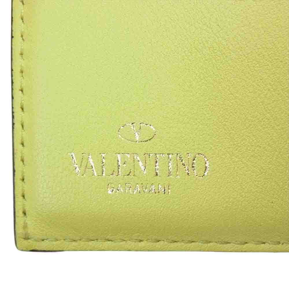 VALENTINO ヴァレンティノ GARAVANI ガラヴァーニ ロックスタッズ 三つ折り ミニ財布 イエロー系【中古】