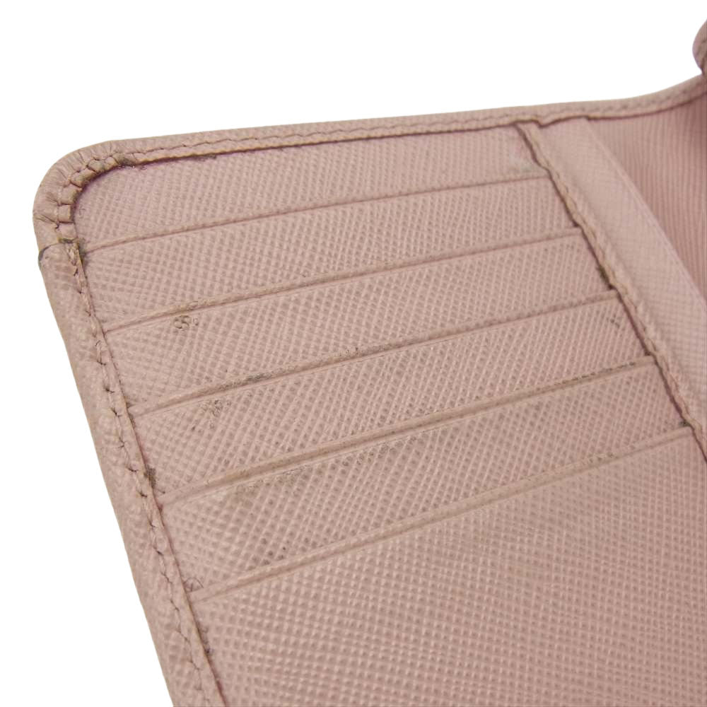 PRADA プラダ メタルロゴ 二つ折り レザー 財布 ピンク系【中古】