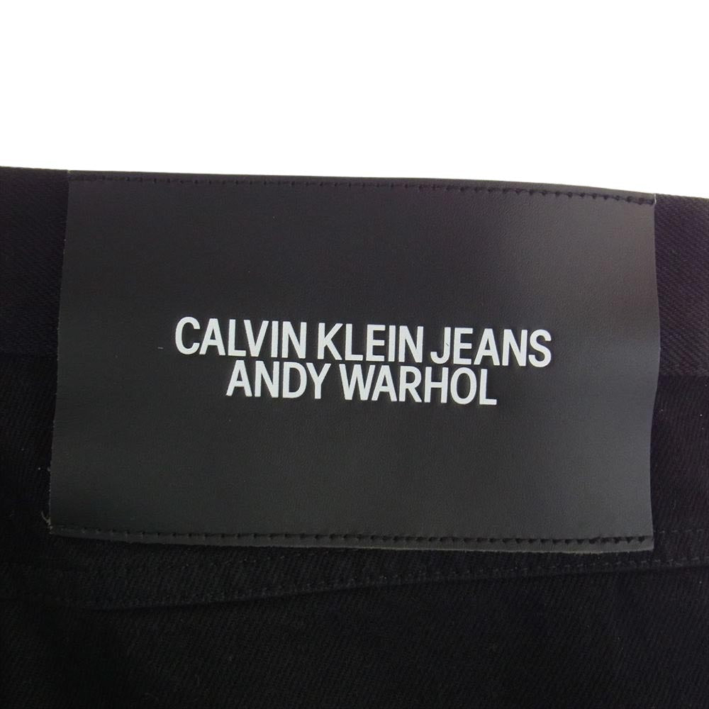 カルバンクライン 18SS RAFSIMONS ラフシモンズ期 ANDY WARHOL アンディウォーホル Green Disaster 10 times ペイント加工 デニムパンツ ブラック系 34【中古】