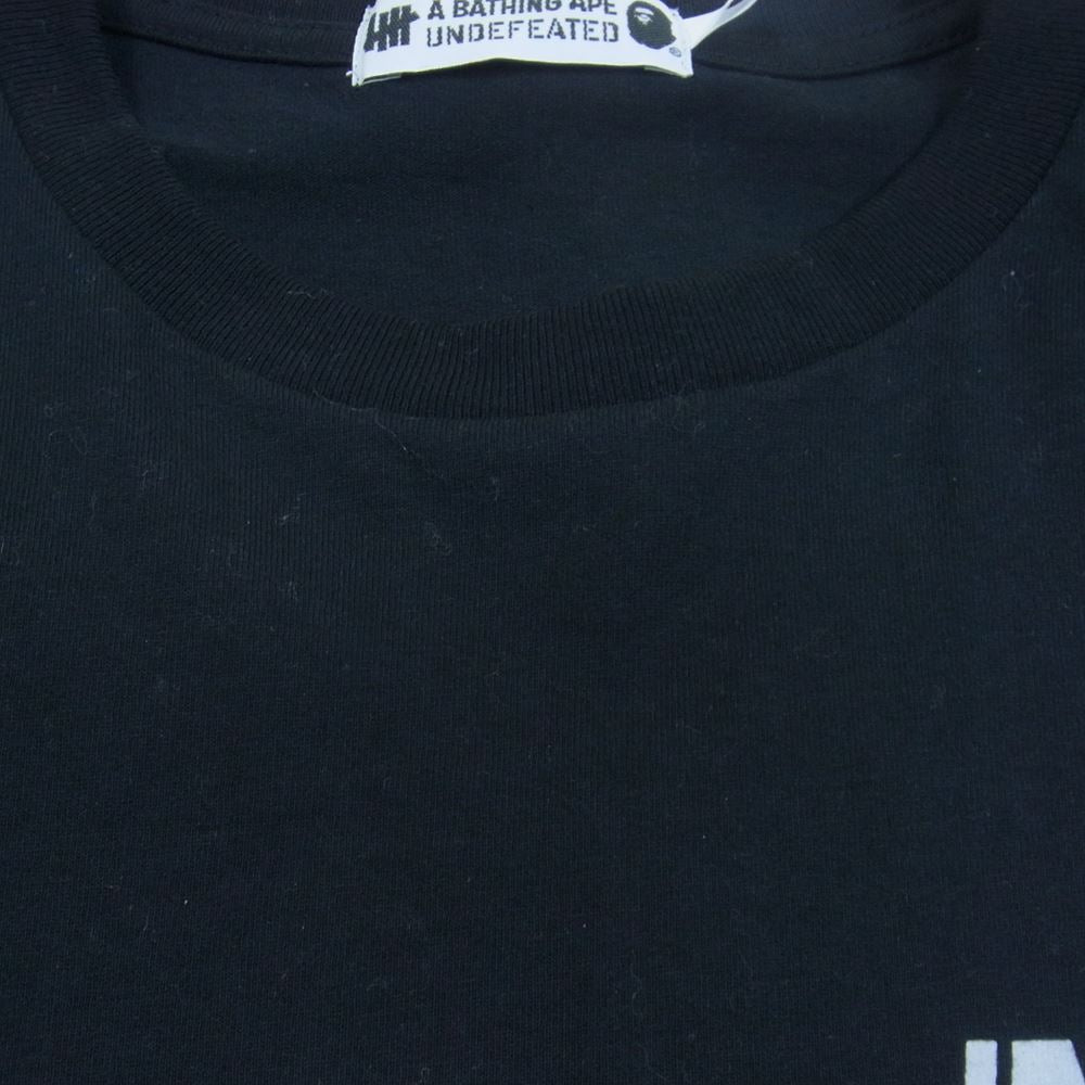 A BATHING APE アベイシングエイプ 001LTG731903X × UNDEFEATED アンディーフィーテッド LONG SLEEVE TEE ロングスリーブ Tシャツ ブラック系 L【中古】
