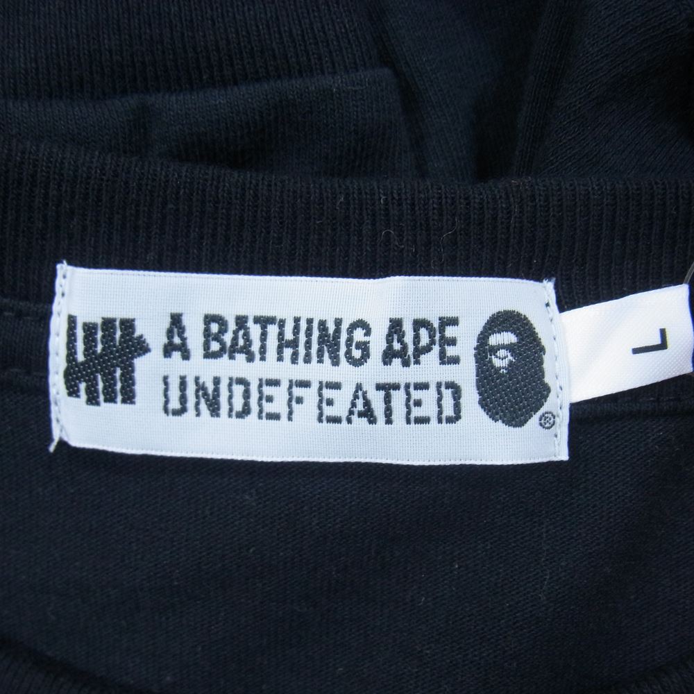 A BATHING APE アベイシングエイプ 001LTG731903X × UNDEFEATED アンディーフィーテッド LONG SLEEVE TEE ロングスリーブ Tシャツ ブラック系 L【中古】