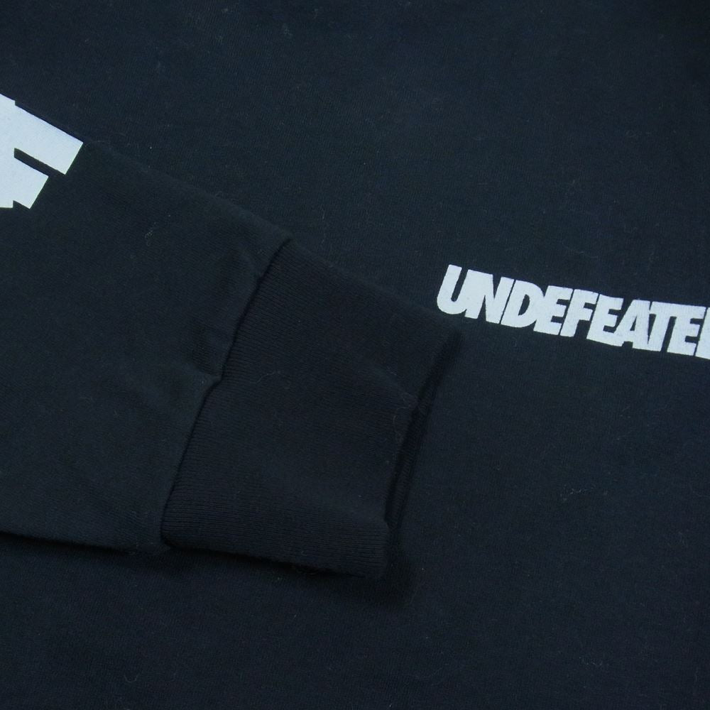 A BATHING APE アベイシングエイプ 001LTG731903X × UNDEFEATED アンディーフィーテッド LONG SLEEVE TEE ロングスリーブ Tシャツ ブラック系 L【中古】