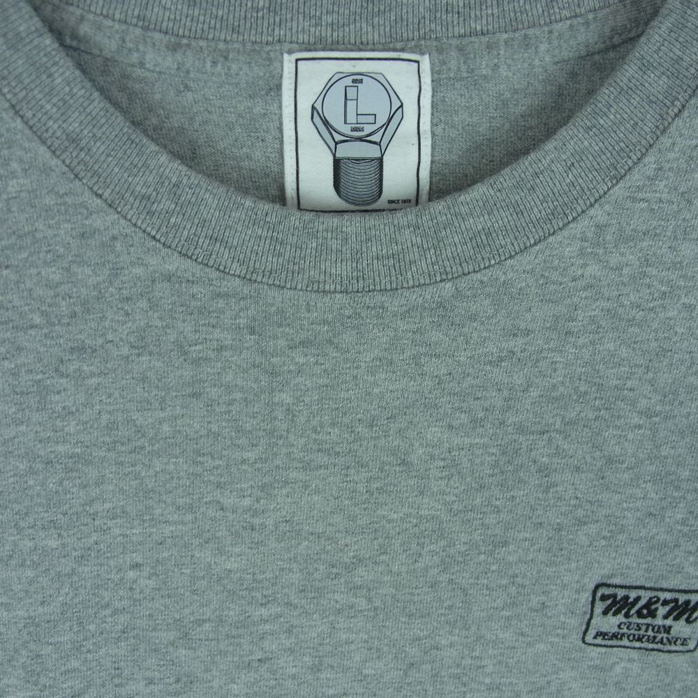 エムアンドエム CUSTOM PERFORMANCE カスタムパフォーマンス ロゴプリント クルーネック ロングスリーブ カットソー 長袖 Tシャツ グレー系 L【中古】