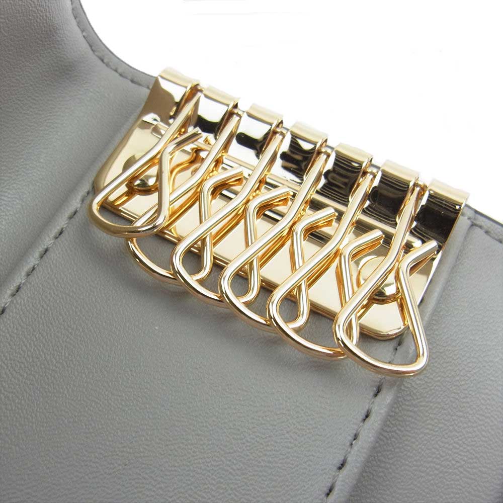 Michael Kors マイケルコース 35S0GFTP5B FULTON MKシグネチャー 6連 キーケース ホワイト系【新古品】【未使用】【中古】