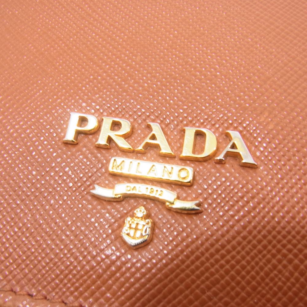 PRADA プラダ 1M1132 SAFFIANO METAL サフィアーノ メタル 二つ折り 長財布 オレンジ系【中古】