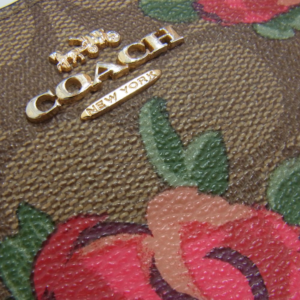 COACH コーチ F39189 シグネチャー フラワー プリント 長財布 ブラウン系【中古】