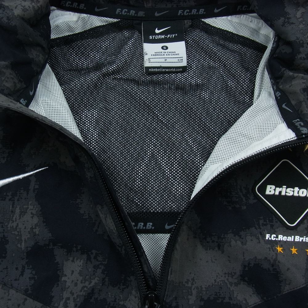 F.C.R.B. エフシーアールビー 716113-060 NIKE ナイキ CAMO STORM-FIT JACKET カモ 迷彩 ストームフィット フード ジャケット グレー系 S【中古】