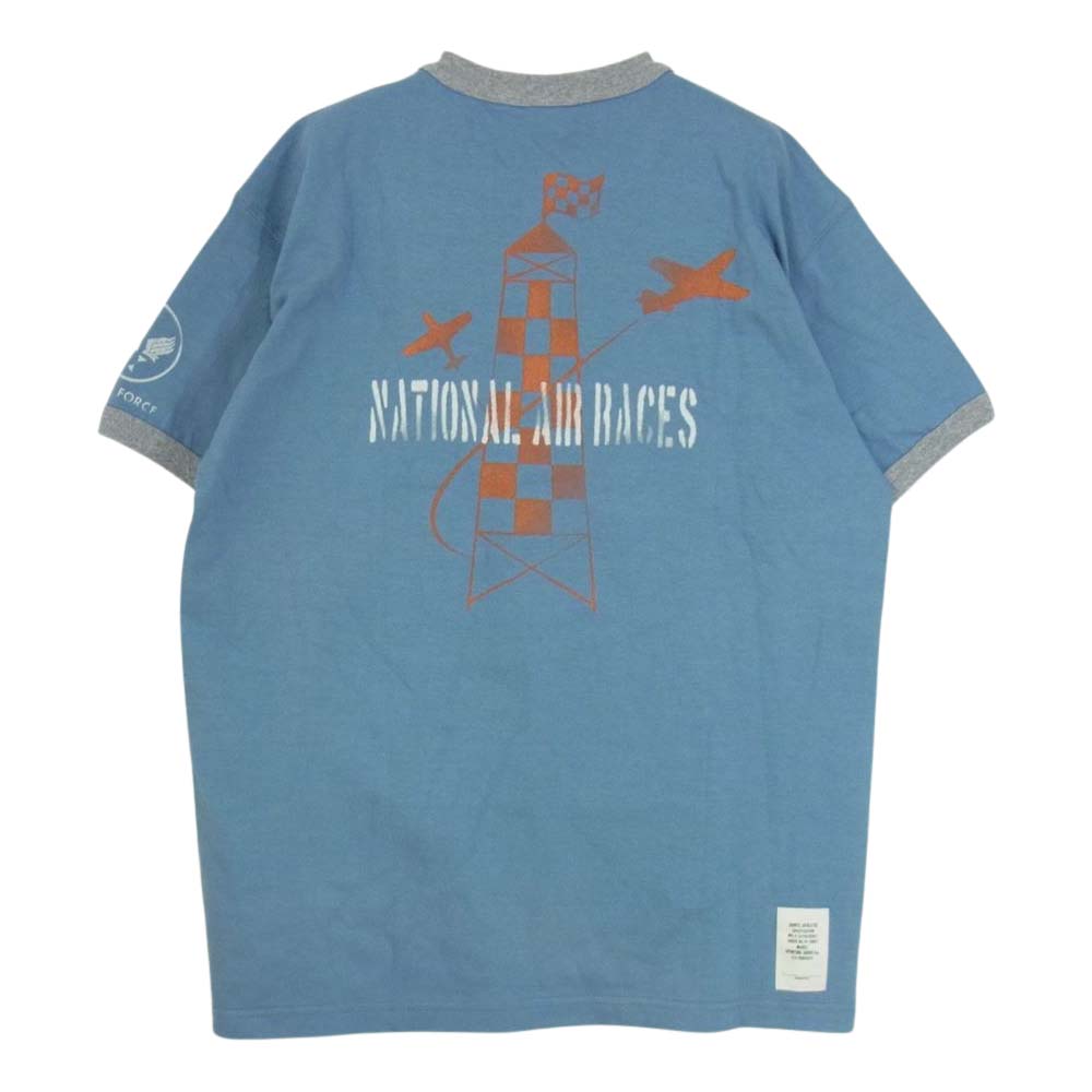 TOY'S McCOY トイズマッコイ KEEP 'EM FLYING 前Vガゼット BUGS BUNNY バッグスバニー マイティー エース フロント プリント ミリタリー Tシャツ ブルー系 L【中古】