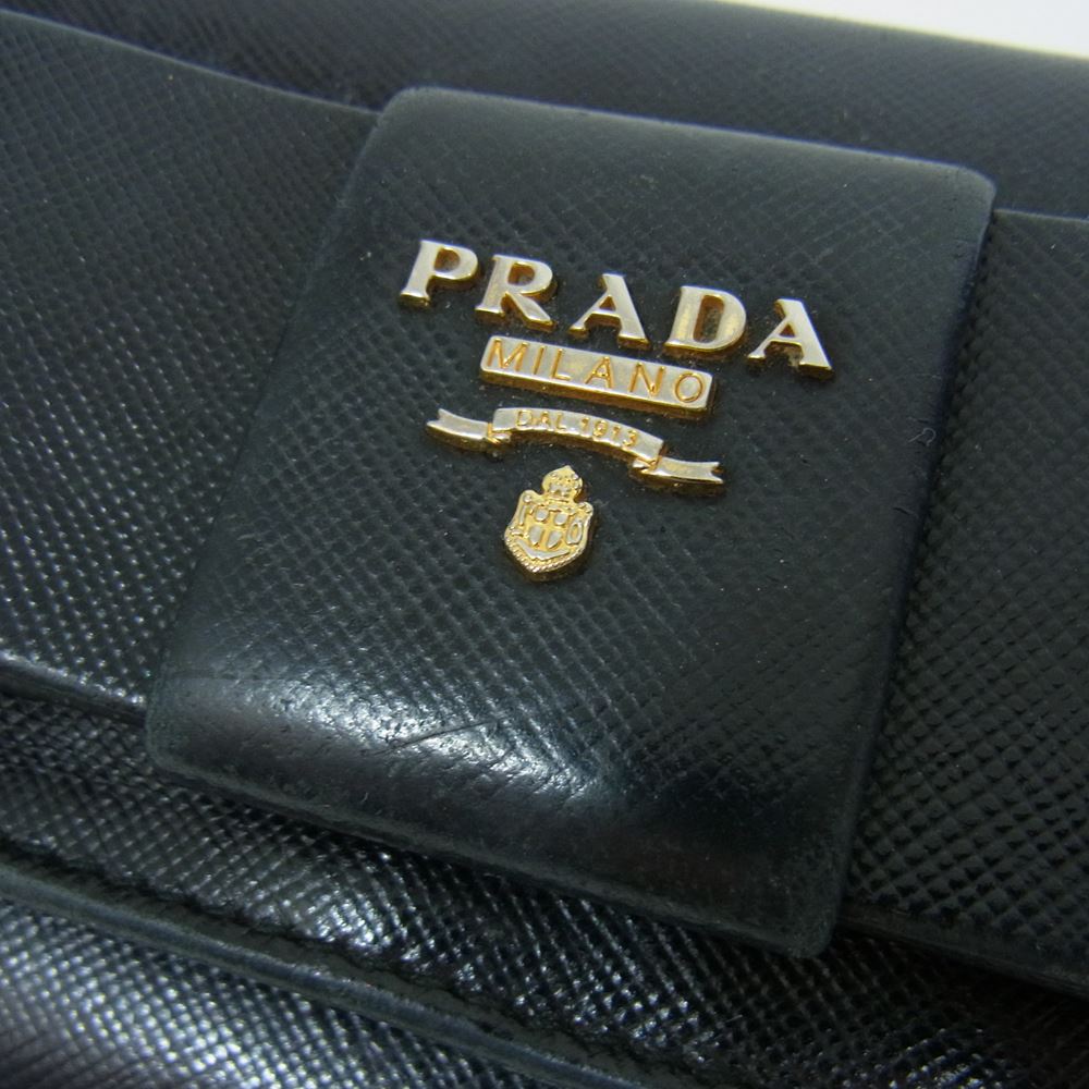 PRADA プラダ サフィアーノ レザー リボン 長財布 ブラック系【中古】