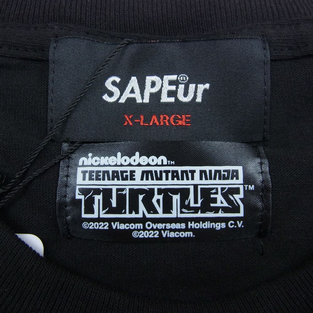 サプール 22SS A0022-141 TURTLES タートルズ プリント ロゴ 半袖 Tシャツ ブラック系 XL【新古品】【未使用】【中古】