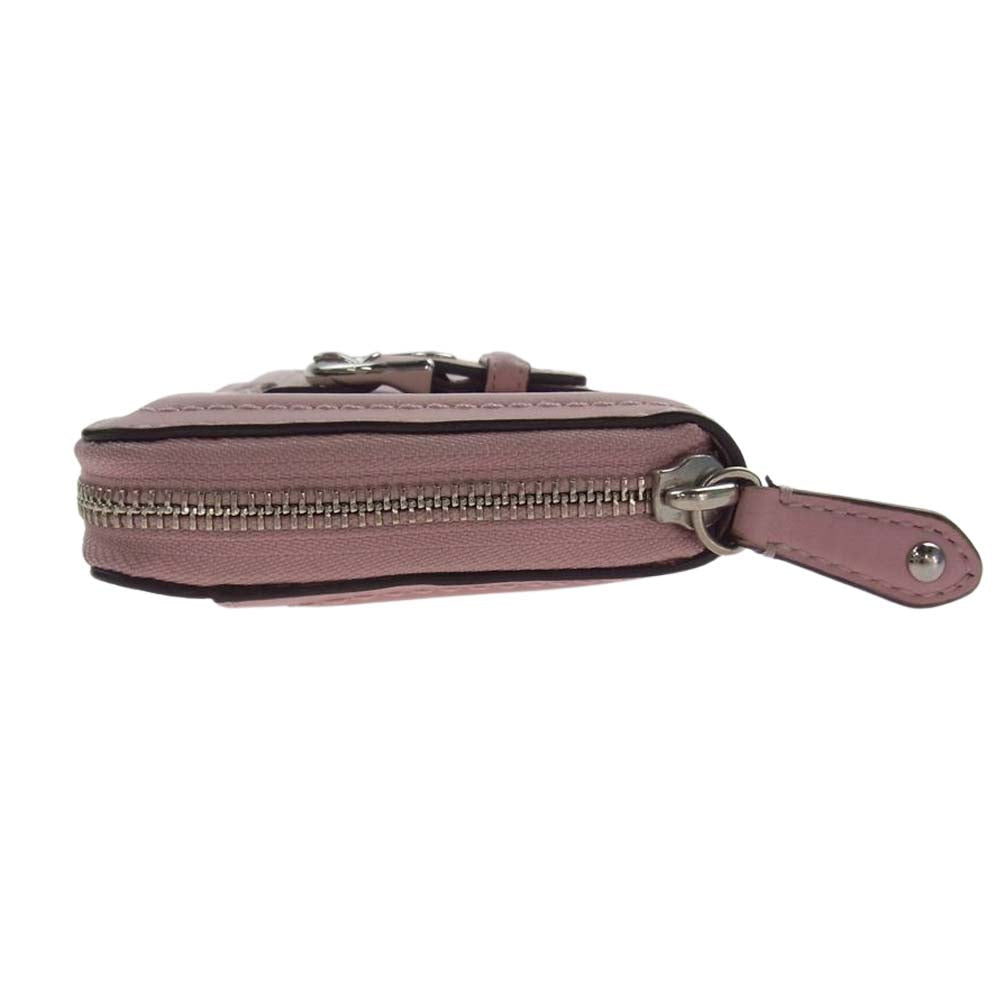 COACH コーチ ベルト付き ラウンドジップ 長財布 ピンク系【中古】